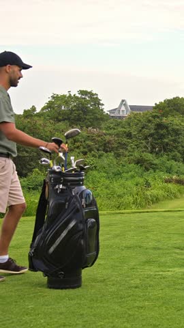 Adult Sports Man Playing on Green Golf Course and Hitting Ball by Club. Athletic Male Person is Real Winner at Championship Cup. Champion Kicking Golfball with Accuracy and Scoring with Birdie Stroke