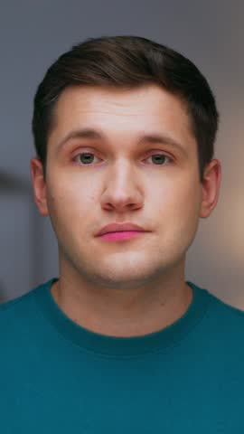 Portrait of Young Man Looking at Camera and Showing Gesture of Close Your Mouth and Stop Talking. Smart Face of Adult Guy Asking to Shut Up. Male Person Gossiping on Mysteries and Warning to Silence