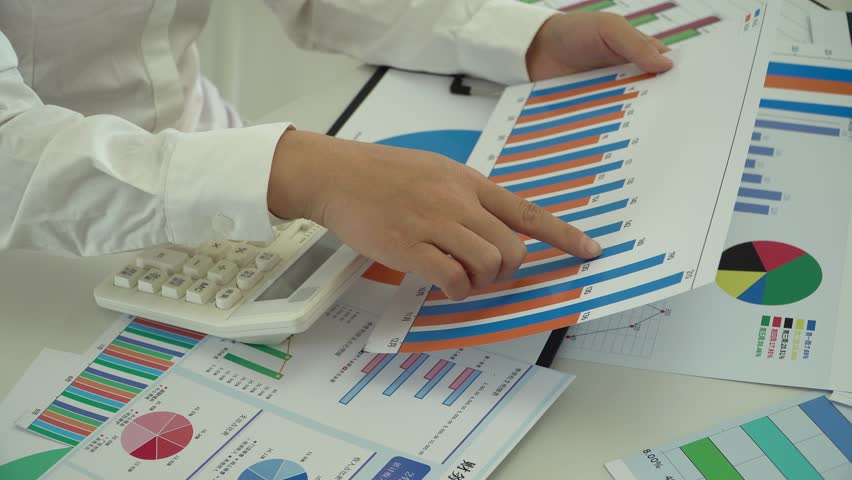 Financial experts are analyzing and studying financial data