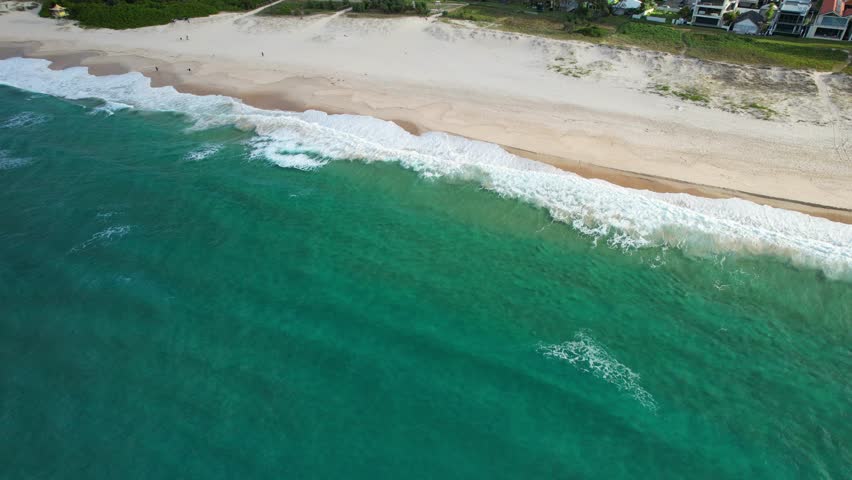 Foamy Waves In The Shoreline Of Palm Beach In Queensland, Australia - Drone Shot
