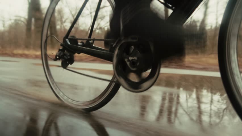 Cyclist Spinning Wheels and Pedaling . Urban Transportation Sustainable Mobility. Exercise And Training Wheel Spinning. Bike Commuting Endurance Activity. Dynamic Outdoor Cycling. Recreational Riding