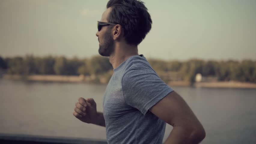 Man Running Outdoors. Active Lifestyle And Fitness Journey. Healthy Living Sporty Male. Outdoor Exercise Urban Running. Physical Activity Wellness And Health. Determination And Stamina Morning Run