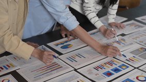 Business team analyzing financial documents and marketing reports strategy meeting, project planning teamwork collaboration at office, b2b corporate strategy, data analytics for business growth - Powered by Shutterstock - Get 15% off with code: PIKWIZARD15