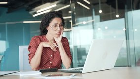Disappointed young female employee having difficulty with task on computer while sitting at workplace in business office. Puzzled confused businesswoman cannot solve problems while working on project - Powered by Shutterstock - Get 15% off with code: PIKWIZARD15