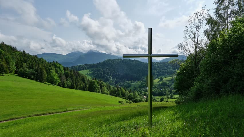 Timelapse: Cross in Green Rural Mountain Landscape