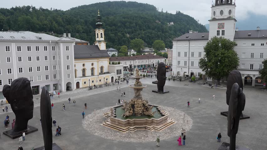 Austria Salzburg  26 July 2025.Historic square in Salzburg, Austria, located beside the iconic Salzburg Cathedral, featuring baroque architecture, cobblestone streets.