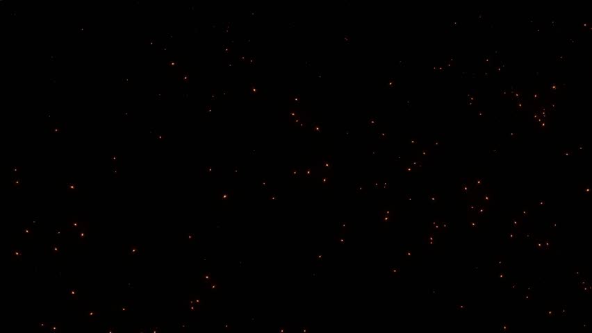 Loop flickering glow gold orange dust stars particles animation motion falling on black abstract Background. Gold stars particle on black background motion titles cinematic