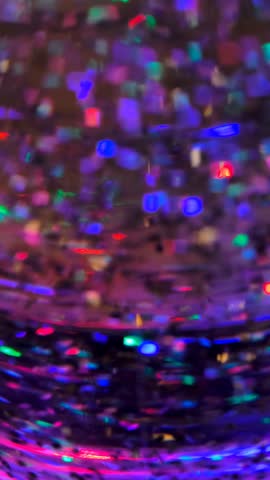 Slow motion cinematic 4K B roll footage of violet glitter abstract background with sparkling particles creating eye-catching visual effect in vertical format. This aesthetic b roll captures the high-resolution shimmer with clean composition and dramatic lighting perfect for social media and digital promotions. The faceless b roll features minimalist style framing with copy space ideal for storytelling visuals, commercial background, wallpapers, and marketing use. High resolution cinematic footage showcases the mesmerizing glitter movement, vibrant violet tones, and luxurious sparkle atmosphere with glamorous visual flow, perfect for modern lifestyle branding, beauty marketing, fashion advertising campaigns, celebration content, event projects, social media stories, corporate presentations, and creative projects requiring eye-catching abstract and elegant shimmer visuals.