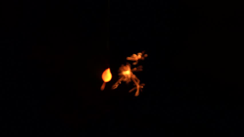 Image of people playing with sparklers