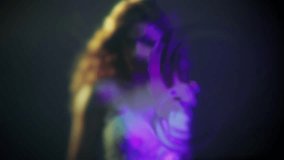 A mysterious beauty underwater, pokes her finger into the surface of the water separating her and the screen, circles on the water, touching . Glamorous underwater portrait, mysterious female face - Powered by Shutterstock - Get 15% off with code: PIKWIZARD15