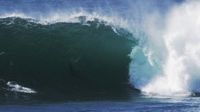 Backlit wave builds into a barrel with textured mist and glowing energy - Powered by Shutterstock - Get 15% off with code: PIKWIZARD15