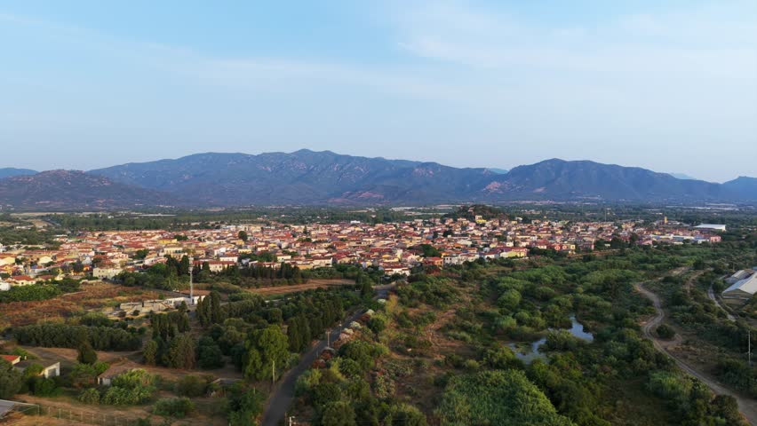 Pula town at sunrise, Sardinia in Italy. Aerial drone