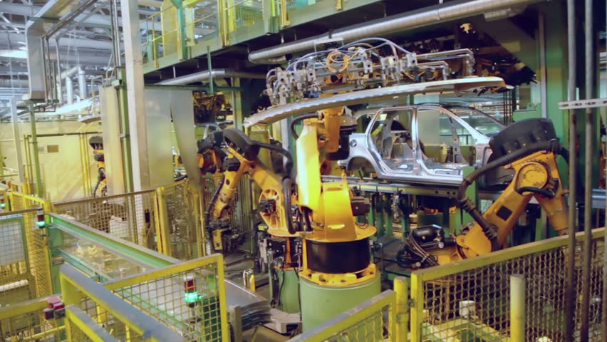 Robotics assemble automobile at conveyer in factory workshop Royalty-Free Stock Footage #3851396