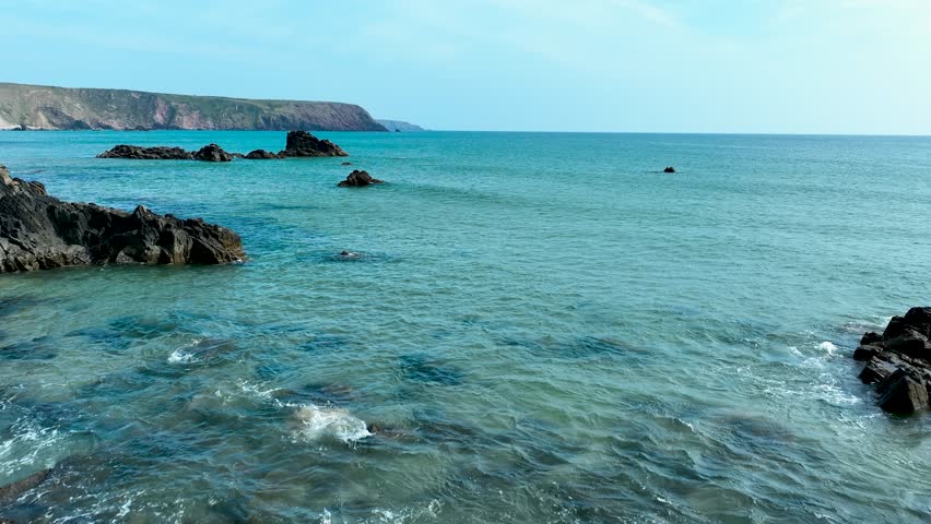 Scenic Welsh Beach with Rocky Cliffs. Wales. Aerial Shot