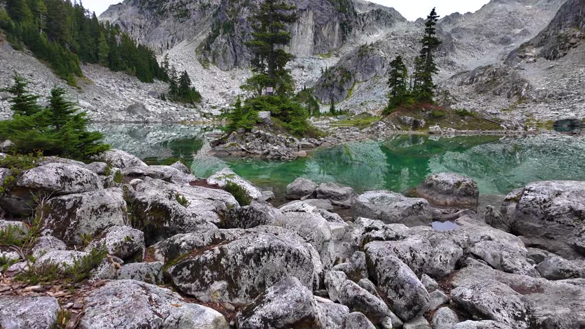 Scenic Watersprite Lake in British Columbia, Canada with Pristine Turquoise Waters and Mountain Reflections