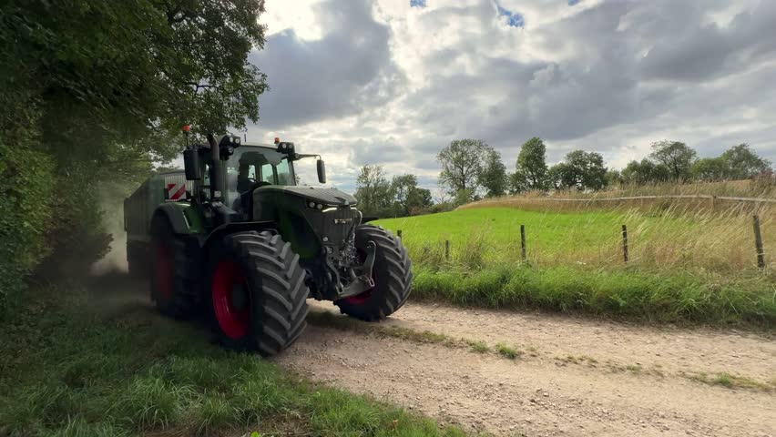 Harvest Time - Agricultural vehicle on a farm track at harvest time - North Yorkshire in the northeast of England.