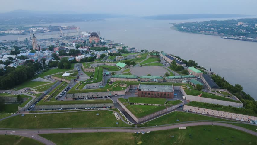 Aerial view of the Citadel of Quebec on the banks of the Saint Lawrence River near the Chateau Frontenac in a smoky atmosphere caused by forest fires in the Canadian plains. Summer 2025, Canada.