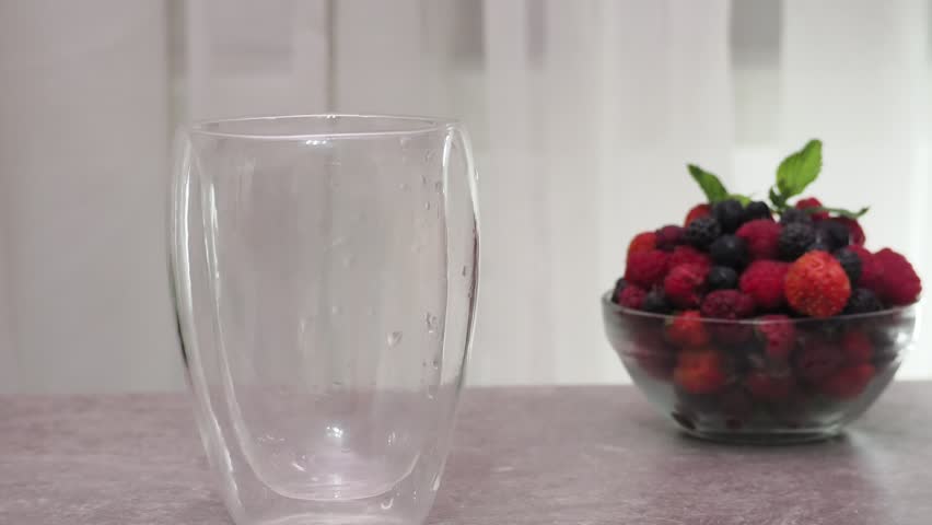 Healthy Refreshing Mixed Berry Breakfast Smoothie with Raspberries and Blueberries. drink prepared at home healthy nutrition low calorie diet