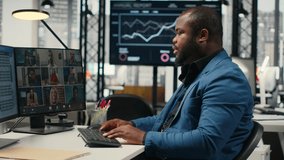 Black analyst meeting on online video call with associates to discuss insights and resource allocation, discussing about statistics with investors group via remote web chat. Camera B. - Powered by Shutterstock - Get 15% off with code: PIKWIZARD15