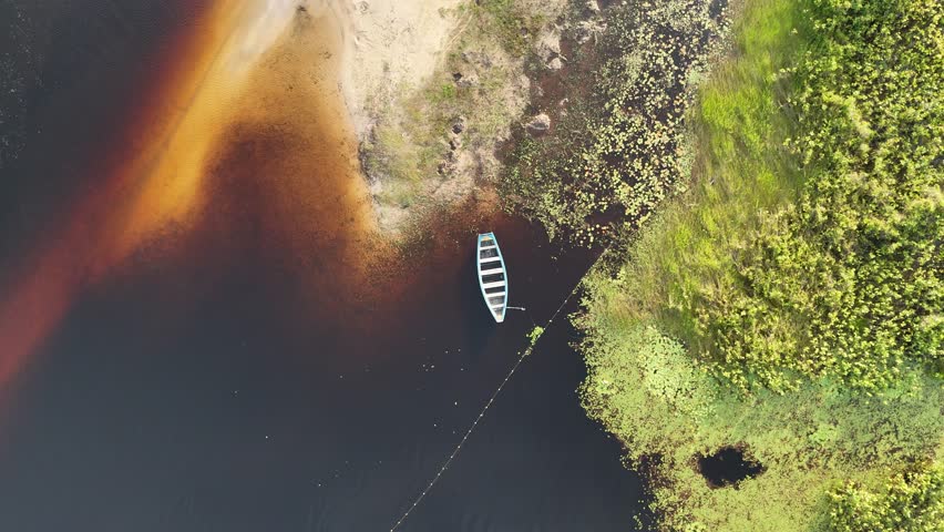 Isolated Canoe At Santo Amaro In Maranhao Brazil. Nature Landscape. Beautiful Rainforest. Isolated Canoe In Maranhao. Mangrove Scenery. Colored River. Native Village. Brazil Northeast.