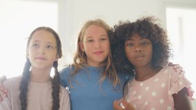 Portrait of Happy diverse children girl friends playing together in classroom. School student enjoy and fun learning, studying and playing for development knowledge education at primary school. - Powered by Shutterstock - Get 15% off with code: PIKWIZARD15