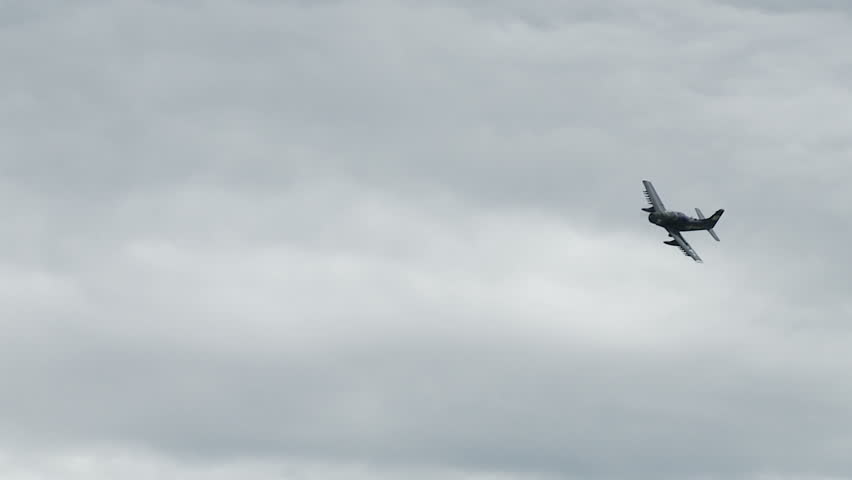 US Marines' Douglas Skyraider historic war plane flies past showing the under