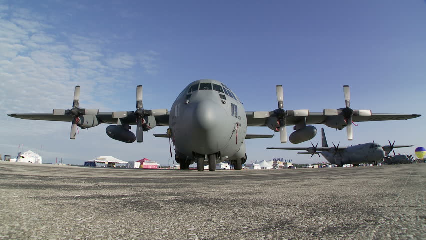Lockheed Hercules military transport aircraft parked at an airshow.  Static