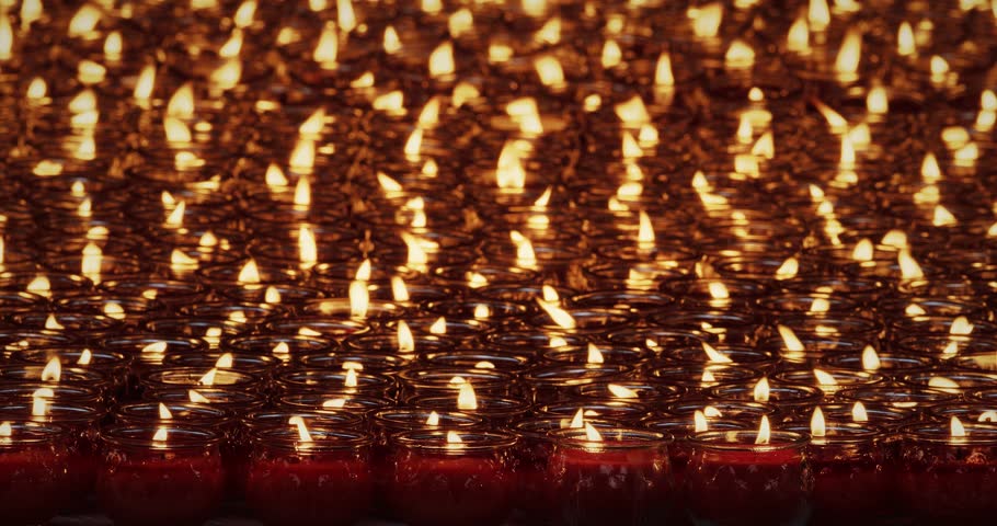 Chengdu, Sichuan, China. Close-up View Of Burning Red Candles In Glass. Concept For Faith, Religion And Spirituality. Religious Ritual In Temple. Many Oil Lamps Burning At Wenshu Monastery Buddhist