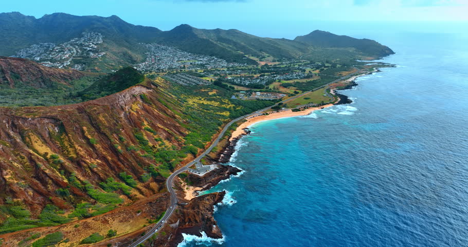 Highway along the picturesque shore of the Pacific Ocean. Stunning scenery of rocky landscape of Honolulu, Oahu, Hawaii. Aerial perspective.