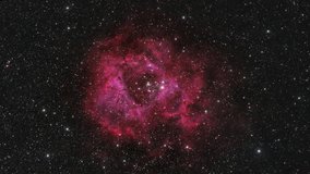 Flying through cosmos to the core of Rosette Nebula. High quality 4k footage - Powered by Shutterstock - Get 15% off with code: PIKWIZARD15