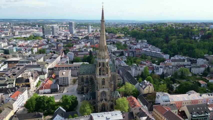 Aerial view of the Cathedral of the Immaculate Conception towering over central Linz. Linz, Austria