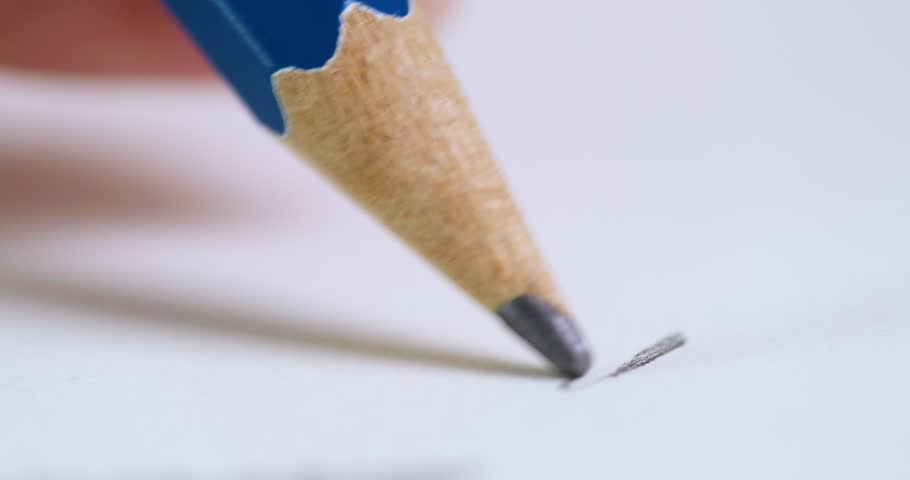 A close-up view of a pencil sketching capturing the artistic process an indoor workspace.