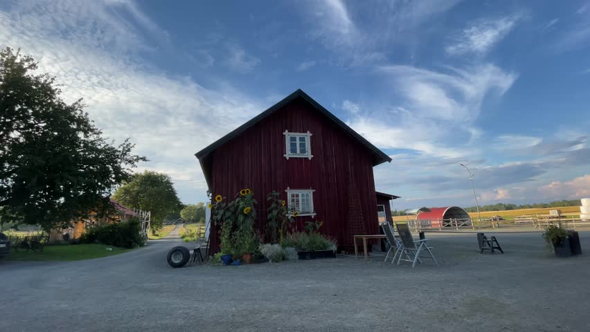 Farm land and stable during the summer. Near Lidköping, Sweden.