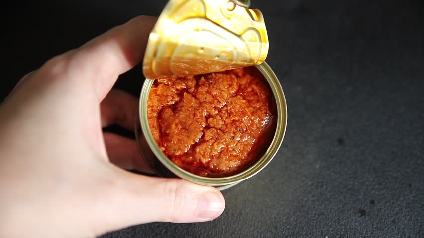 Tuna tomato sauce canned fish seafood fresh delicious gourmet food background on the table rustic food top view copy space keto and paleo diet vegan food pescetarian diet
