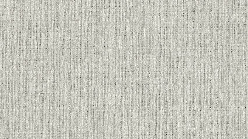 Camera slowly zooms into intricate, stringy grey fibers in macro detail