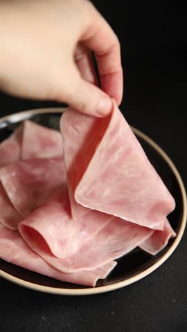 Ham slices meat spam pork fresh delicious gourmet food background on the table rustic food top view copy space