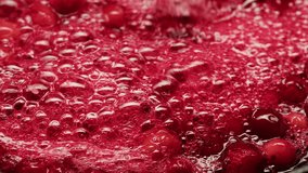 Frozen cranberries cooking for tea or jam, Background Close up of cranberry berries in on the kitchen, chef making dessert healthy pie. - Powered by Shutterstock - Get 15% off with code: PIKWIZARD15