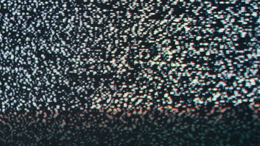 Retro TV, vintage television In a nostalgic setup, a retro TV displays grain on screen, scary halloween night device good for chroma key and green screen.