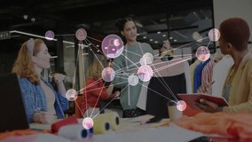 Network appearing around fashion team while designer lifting dresses for collaborative review. Collaboration, creativity, fashion, innovation, teamwork, design, technology - Powered by Shutterstock - Get 15% off with code: PIKWIZARD15