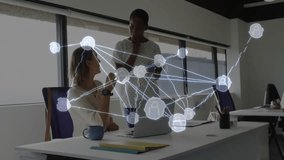 Standing coworker entering beside laptop and initiating AR overlay for reviewing network analytics. Collaboration, innovation, technology, workspace, professionalism, digital, meetings - Powered by Shutterstock - Get 15% off with code: PIKWIZARD15