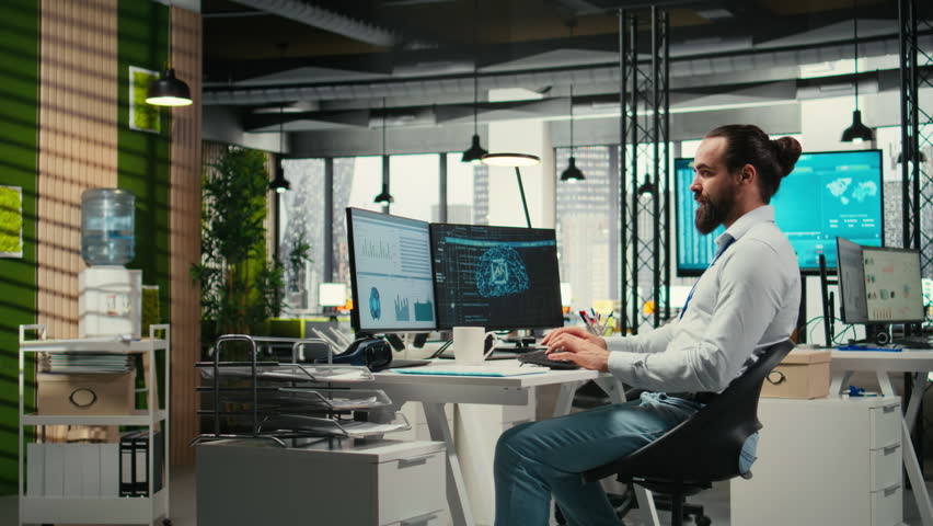 IT specialist uses AI neural networks for data sharing and digitalization, working in a multinational company with automation tools. Artificial intelligence models for business success. Camera A.