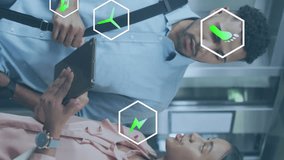 Animation of icons over diverse coworkers discussing reports on digital tablet in office. Digital composite, multiple exposure, hazardous, recycling, planning, teamwork and technology concept. - Powered by Shutterstock - Get 15% off with code: PIKWIZARD15