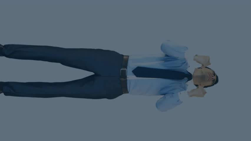 Stock market data processing against caucasian businessman celebrating against grey background. business data and analytics technology concept - Powered by Shutterstock - Get 15% off with code: PIKWIZARD15