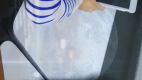 Animation of globe and chart over student using laptop and cellphone in classroom. Digital composite, globalization, school, data, education, childhood, e-learning and technology concept. - Powered by Shutterstock - Get 15% off with code: PIKWIZARD15