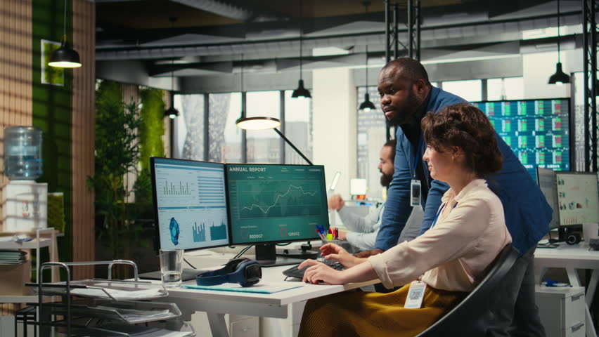 Diverse office coworkers reviewing monthly data graphs to create reports, applying business strategy and analysis to drive innovation and improve company performance. Work alliance. Camera A. - Powered by Shutterstock - Get 15% off with code: PIKWIZARD15