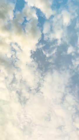 Time lapse clouds Sunset light and clousd moving 4k vertical video