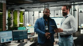 Businessmen analysts monitoring efficiency insights at the workspace, utilizing analytics to plan forecast for detailed performance metrics and statements, business management. Camera A. - Powered by Shutterstock - Get 15% off with code: PIKWIZARD15