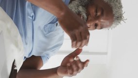 Animation of social media data processing over african american man using laptop. Global social media, digital interface, computing and data processing concept digitally generated video. - Powered by Shutterstock - Get 15% off with code: PIKWIZARD15