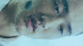 Animation of media icons over asian businessman using phone headset in office. Global business, technology and digital interface concept, digitally generated video. - Powered by Shutterstock - Get 15% off with code: PIKWIZARD15