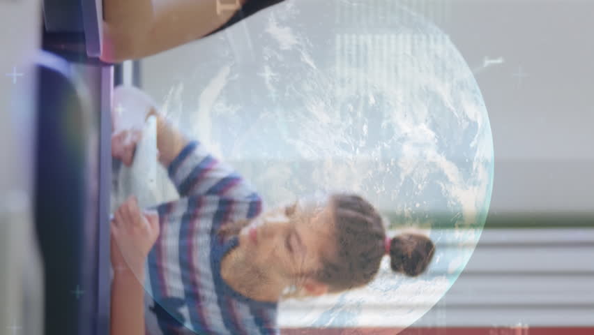 Stock market data processing over a globe against african american boy using digital tablet in class. back to school and education concept - Powered by Shutterstock - Get 15% off with code: PIKWIZARD15
